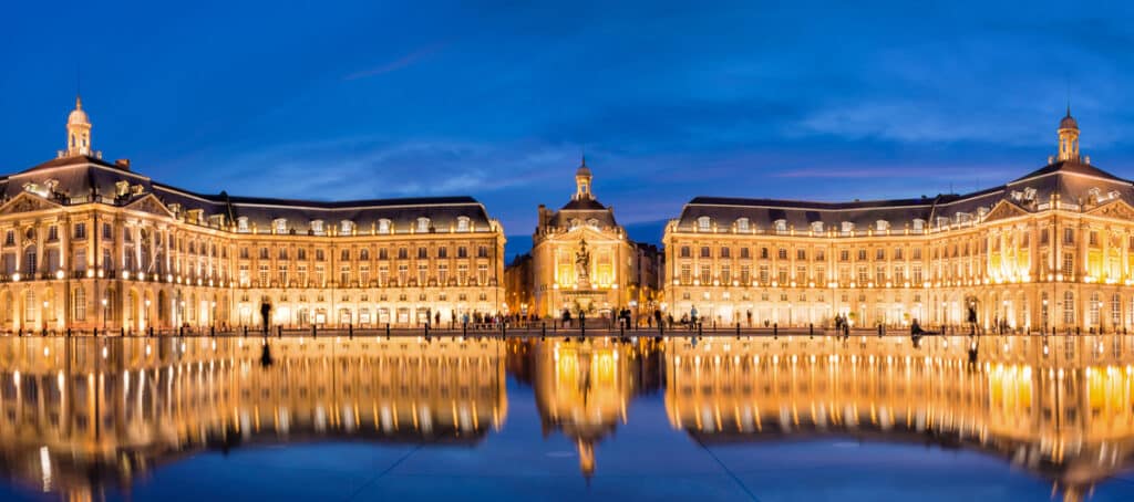 Place la Bourse in Bordeaux, the water mirror by night, France